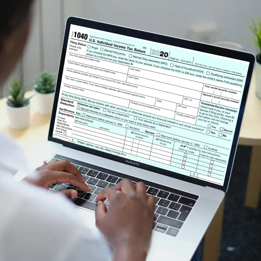 computer screen with US individual income tax return form loaded on screen. US Tax test individual